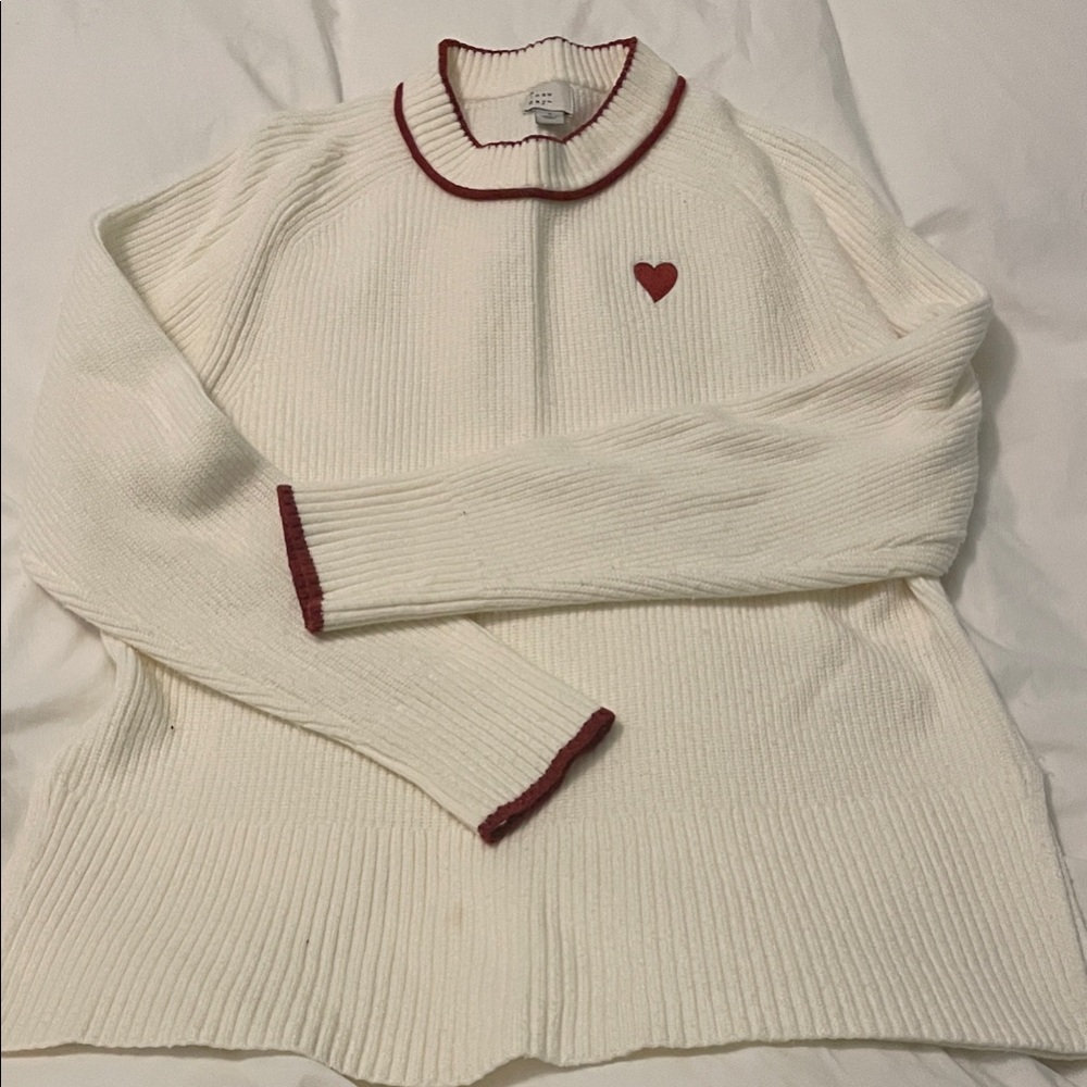 a new day Cream Sweater with Red Accents